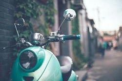 Scooter parked on a quiet street